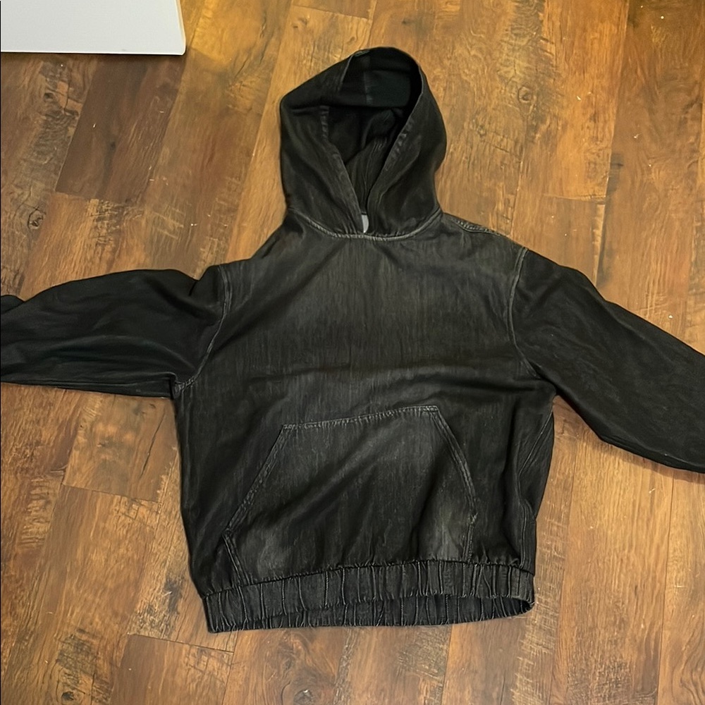 Mode of One Black and Gray Hooded Pullover